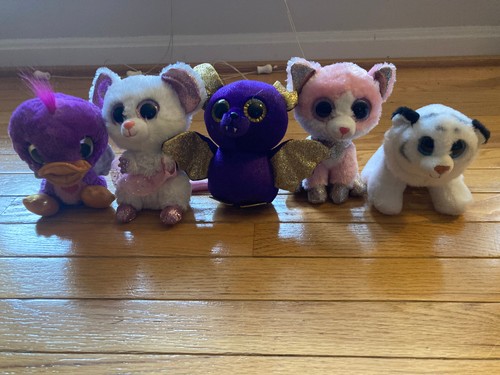 Assorted stuffed animals with - assorted,